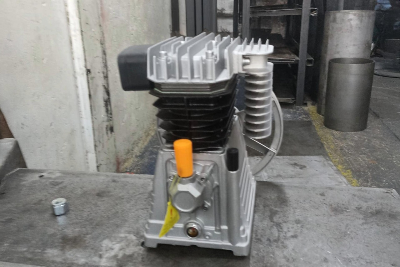 Cabezote para compresor con transmisión por polea